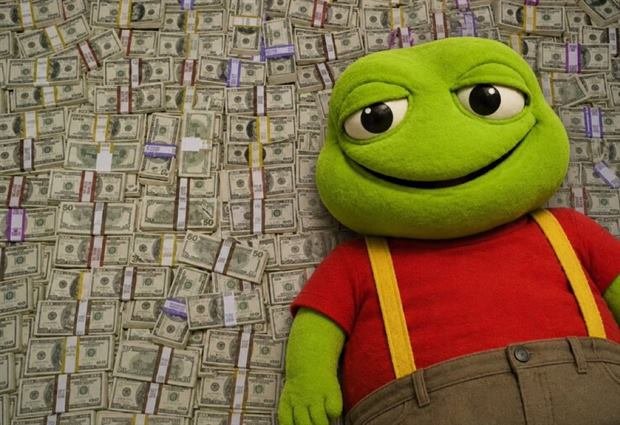 New Acts ($TOAD) on Onchain Circus The red-shirted toad puppet lying on a floor covered completely in banded stacks of US banknotes, smiling at the camera.